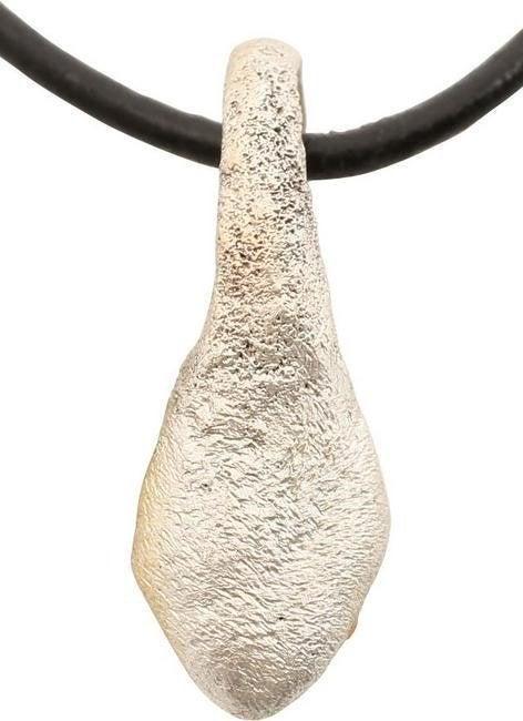 VIKING SORCERER’S AMULET NECKLACE C.850-1050 AD: Slightly over 3/4" height. Bronze, originally silvered, shaped like a duck's foot in swimming form a large suspension loop. A burial at Viden, Denmark contained the body of a woman of wealth and statu