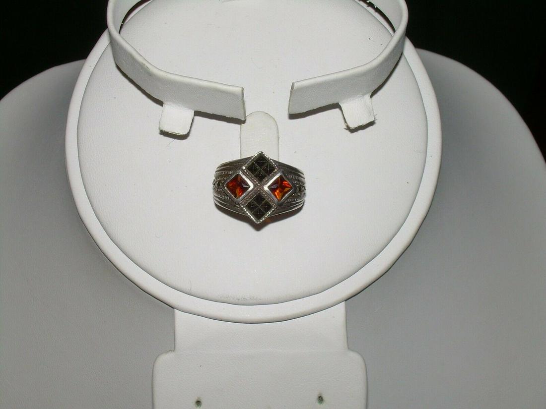 Sterling Garnet & Marcasite Ring W/ Reflective Dark: Vintage sterling silver ring with inlaid Garnet and faceted dark silver bead for contrast. The stones are in a diamond like bezel setting. The ring is accented with marcasite throughout. Reserve: $30.