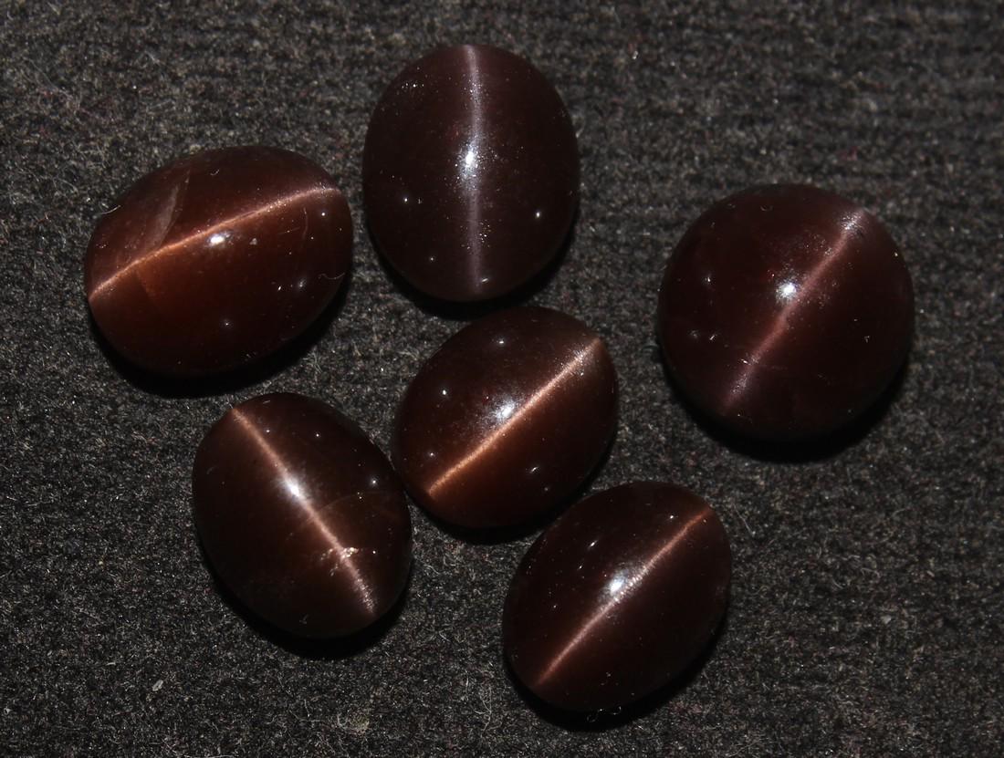 16.15 Cts Natural Scapolite Cat's-Eye Lot: No Reserve! Title: 16.15 Cts Natural Scapolite Cat's-Eye Lot Description: Gemstone : Natural Scapolite Variety: Cat's-Eye Scapolite Origin: Madagascar Weight: 16.15 Carats Dimensions: 9.4x7.4x6 mm - 8
