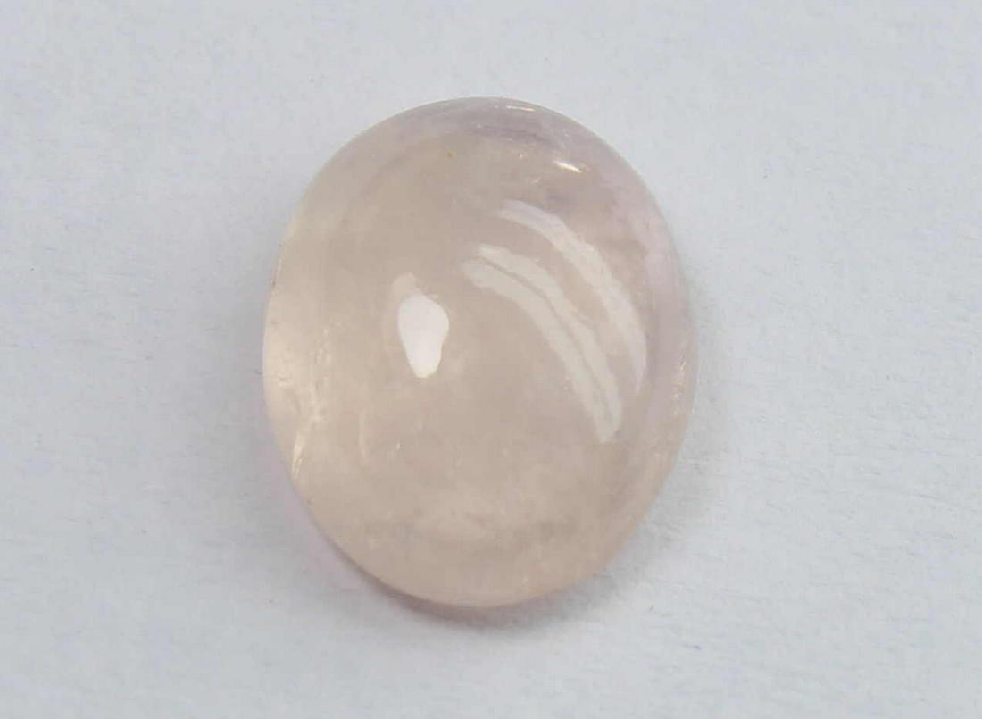 2.56 Cts Natural Morganite: No Reserve! Title: 2.56 Cts Natural Morganite Description: Gemstone: Natural Morganite Origin: Africa Weight: 2.56 Carats Measurements: 10x8x4.2 mm Shape : Oval Cabochon Colour: Peach Transparency: tr
