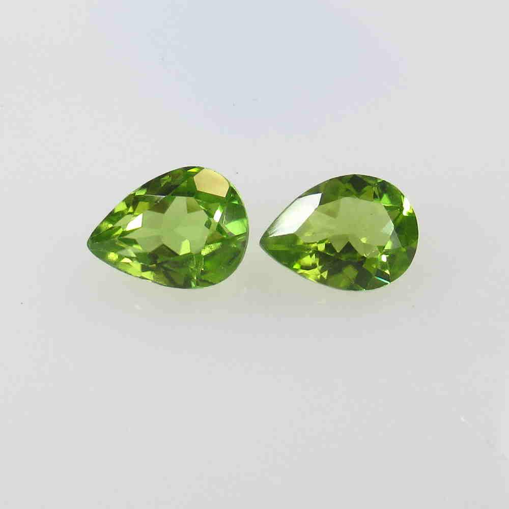 2.23 Ctw Natural Peridot Pear Pair: No Reserve! Title: 2.23 Ctw Natural Peridot Pear Pair Stone Clarity: VVS Gemstones: Peridot Size/Dimensions: 2.23 Carat Weights: 7.90 x 5.90 x 3.30 mm / 2 PC's Additional Information: Top Class Luster
