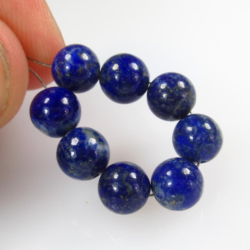 17.61 Ct Natural 8 Lapis Lazuli Drilled Round Ball: No Reserve! Title: 17.61 Ct Natural 8 Lapis Lazuli Drilled Round Ball Beads Stone Clarity: Opaque Gemstones: Natural Lapis Lazuli Beads Carat Weights: 17.61 Size/Dimensions: 6.60 to 6.80 mm / 8 PC's A