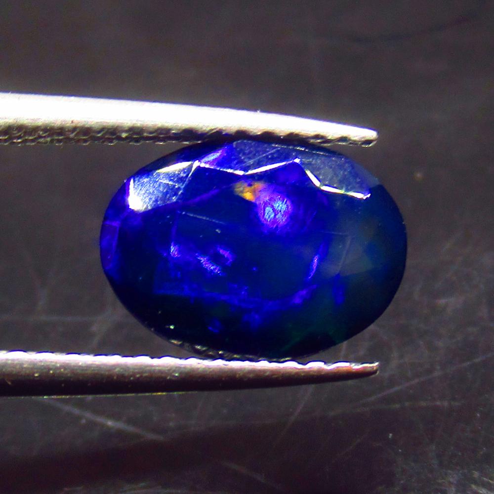 1.71 Ct Natural Ethiopian Black Fire Opal Oval Cut: No Reserve! Title: 1.71 Ct Natural Ethiopian Black Fire Opal Oval Cut Stone Clarity: Translucent Gemstones: Natural Black Opal Carat Weights: 1.71 Size/Dimensions: 9.90 x 7.50 x 5.20 mm Additional Inf
