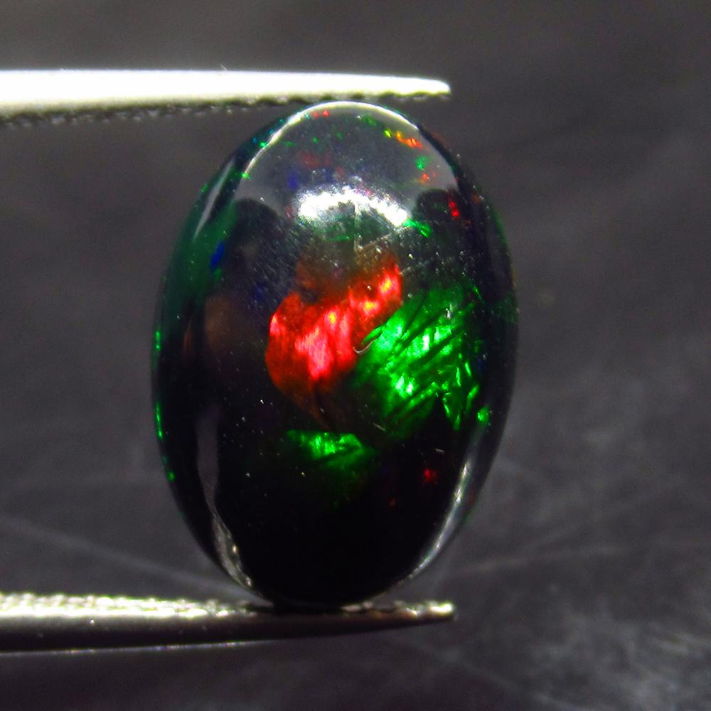 3.93 Ct Natural Ethiopian Black Fire Opal Oval Cab: No Reserve! Title: 3.93 Ct Natural Ethiopian Black Fire Opal Oval Cab Stone Clarity: Translucent Gemstones: Natural Black Opal Carat Weights: 3.93 Size/Dimensions: 13.90 x 10.10 x 6.20 mm Additional I