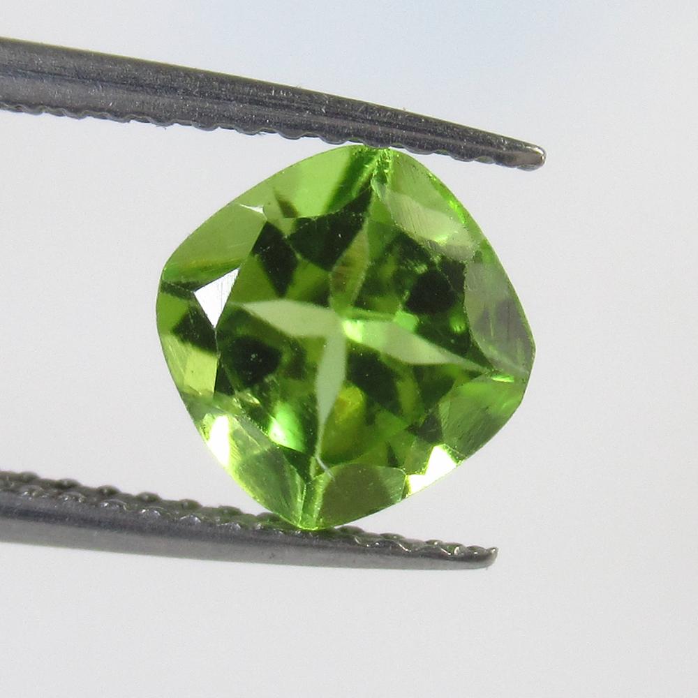 1.56 Ct Natural Pakistan Peridot Cushion Cut: No Reserve! Title: 1.56 Ct Natural Pakistan Peridot Cushion Cut Stone Clarity: VVS Gemstones: Natural Peridot Carat Weights: 1.56 Size/Dimensions: 7.00 x 7.00 x 4.50 mm Additional Information: Top Cla