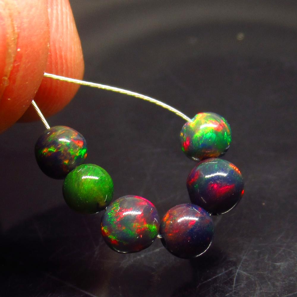 2.68 Ct Natural 6 Drilled Black Fire Opal Beads (1 of 2)