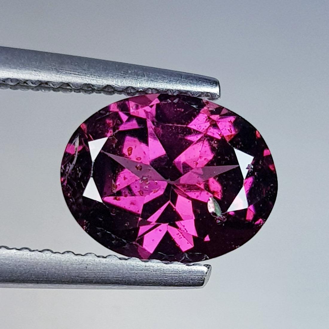 Natural Rhodolite Garnet Oval Cut 1.94 ct: No Reserve! Title: Natural Rhodolite Garnet Oval Cut 1.94 ct Color/Clarity: VVS - VS Carat Weight: 1.94 Dimensions: 8.75 x 6.90 x 4.39 Additional Information: Oval - Burma Shipping: Domestic: Flat-ra
