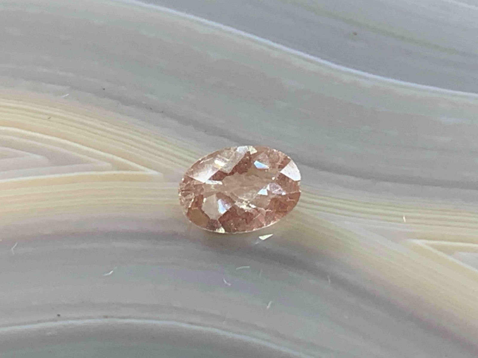 Andesine Labradorite Oval .36 Carats Loose Gemstone: No Reserve! Title: Andesine Labradorite Oval .36 Carats Loose Gemstone Additional Information: Andesine Labradorite Oval .36 Carats Loose Gemstone Materials: Natural Stone Dimensions: 5mmx3mm Shipping