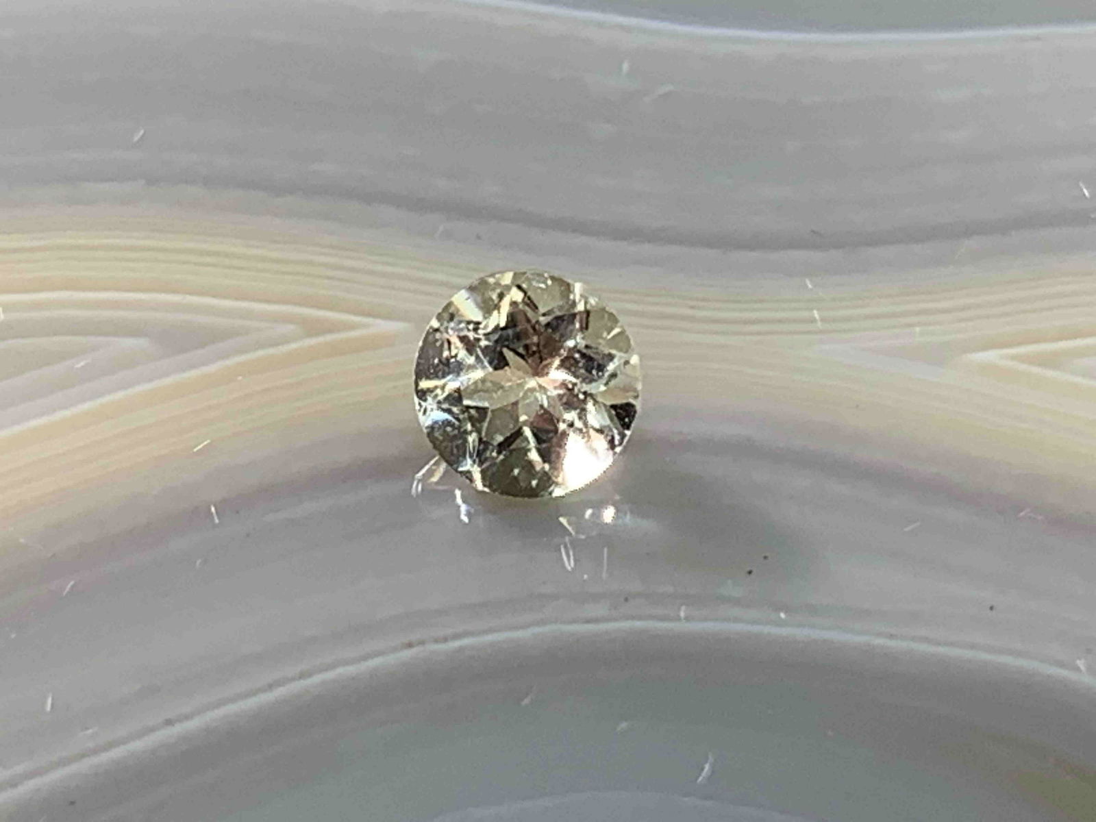 Andesine Labradorite Round .43 Carats Loose Gemstone: No Reserve! Title: Andesine Labradorite Round .43 Carats Loose Gemstone Additional Information: Andesine Labradorite Round .43 Carats Loose Gemstone Materials: Natural Stone Dimensions: 5mm Shipping: