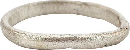 ANCIENT VIKING WEDDING RING, SIZE 3 3/4: C.850-1050 AD. 2.0mm width band of deeply rounded section. Size 3 3/4 for the small finger as was the custom. Vikings exchanged rings on the pommel of the groom's sword. Professionally refurbished wit