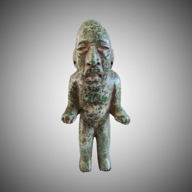 Olmec Kneeling figure: Title: Olmec Kneeling figure Date/Period: ca. 1200 to 600 BCE. Dimensions: Size: 9.8Â” H x 3.5Â” W(25cm x 9cm) Material: Jade Description: Pre-Columbian, Southern Mexico. 1200 to 600 BCE.This ex