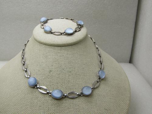 Vintage Sterling Blue Moonstone Necklace & Bracelet: Vintage Sterling Blue Moonstone Necklace & Bracelet Set, WRE W.E. Richards, Mid-Century Modern. Necklace is 15.5" with four pale blue bezel-set moonstones with white glow. The links are oval with open
