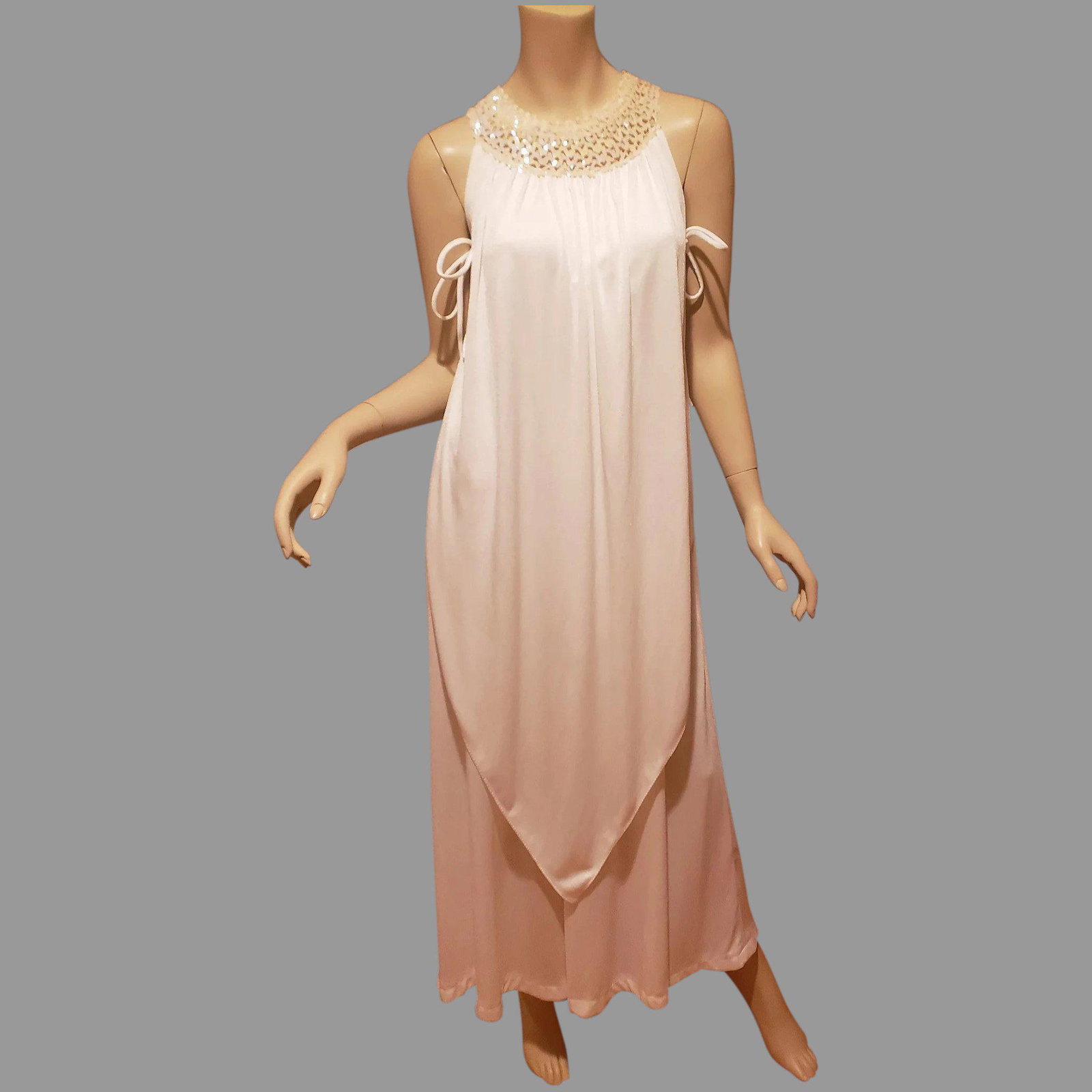 Vtg 1960's Grecian Layered Trapeze maxi gown side ties: True to the Era this one is a beauty with layers side ties Grecian column maxi and Pearl sequins collar details. A size- S In very good vintage condition Reserve: $70.00 Shipping: Domestic: Flat-rate 
