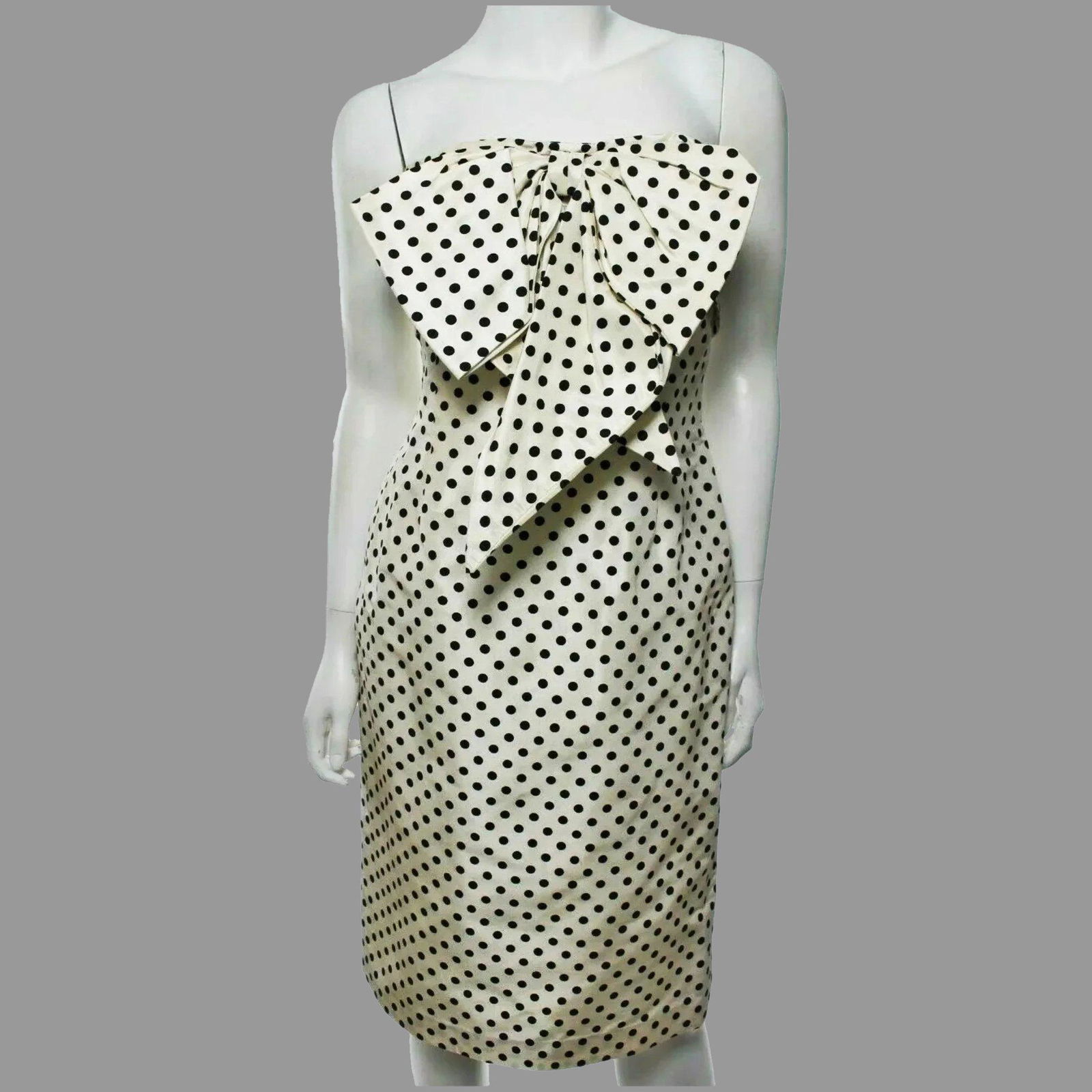 Vtg Bill Blass Couture Polka Dot Papillon Dress Circa: This is a Stunner. Circa 1970's Authentic Bill Blass Couture dress. Ivory/Black Polka Dot with Kitten Front Bow . The dress has a Second bodice with Boning. for hold since it is Strapless. Fabric is I