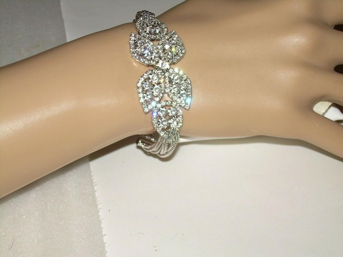 Multi Strand Bead Link Bracelet - Modern Art Deco: Vintage but modern art deco butterfly bracelet with multi strand bead link bracelet. This bracelet is 6" long with a 2" extender. The clasp is a lobster clasp. Many rhinestones throughout the butterfl