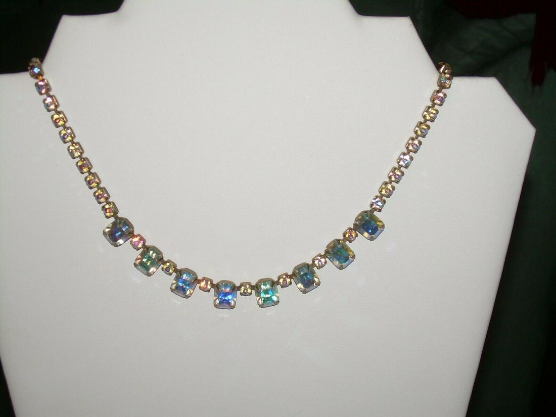 Vintage 1930's Heavy Rhinestone Necklace - 16" Choker: This vintage rhinestone choker necklace is approximately 16" in length. It is a single strand which comes to a center focal point. There are 8 larger rhinestones which measures approximately 10.1 mm b