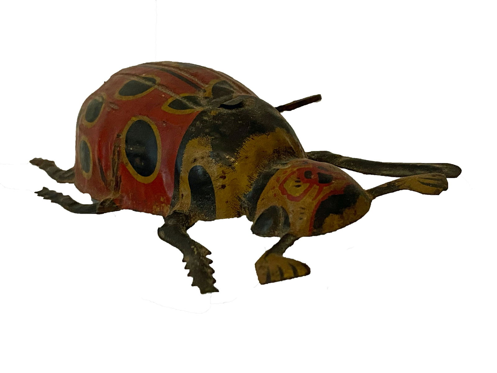 Beetle Wind Up Toy: Title: Beetle Wind Up Toy Dimension: 5" Provenance: A wind up toy in the form of a beetle. It is made of tin with original paint and in working condition. Shipping: Domestic: Flat-rate of $10.00 to an