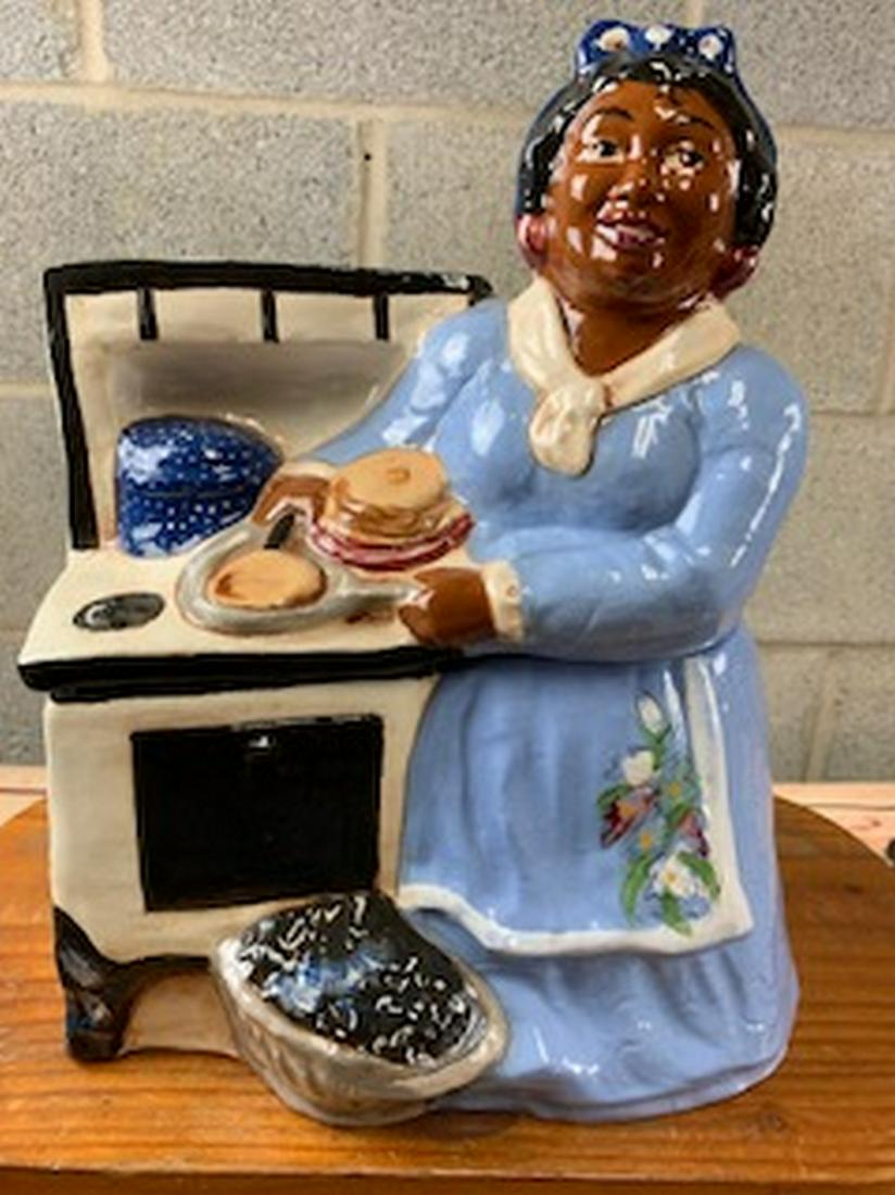 RARE COOKSTOVE MAMMY RICK WISECARVER COOKIE JAR: Title: RARE COOKSTOVE MAMMY RICK WISECARVER COOKIE JAR Date/period: 1990 Dimensions: APPROX 12 X 10 Material: CERAMIC Description: A Wihoa's Art Pottery Jar, hand painted. It is classic americana blac