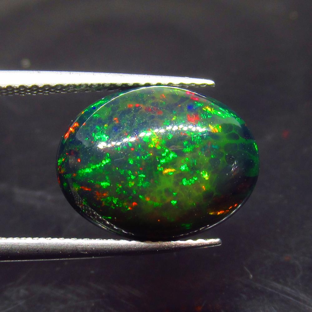 5.19 Ct Natural Ethiopian Black Fire Opal Oval Cab (1 of 2)