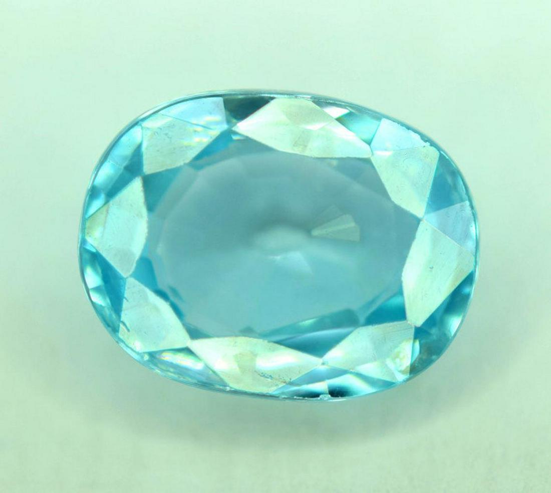 2.25 Gorgeous Color Natural Blue Zircon: Materials: Gemstone, sapphire Carat weight: 2.25 Description 2.25 Gorgeous Color Natural Blue Zircon Weight : 2.25 carat Size : 9 x 6 x 4 mm Treatment : Natural Origin : Africa Standard shipping Reser