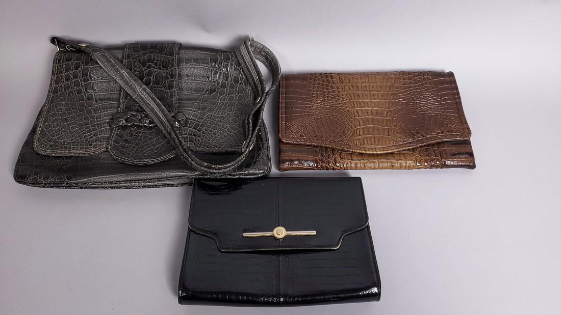 LOTS OF 3 IMITATION SKIN BAGS: Title: LOTS OF 3 IMITATION SKIN BAGS Dimension: Lot of 3 bags: small medium and large size Additional Information: We offer inhouse shipping - Express Fedex shipping = $45; 5-7 working days; Combine s