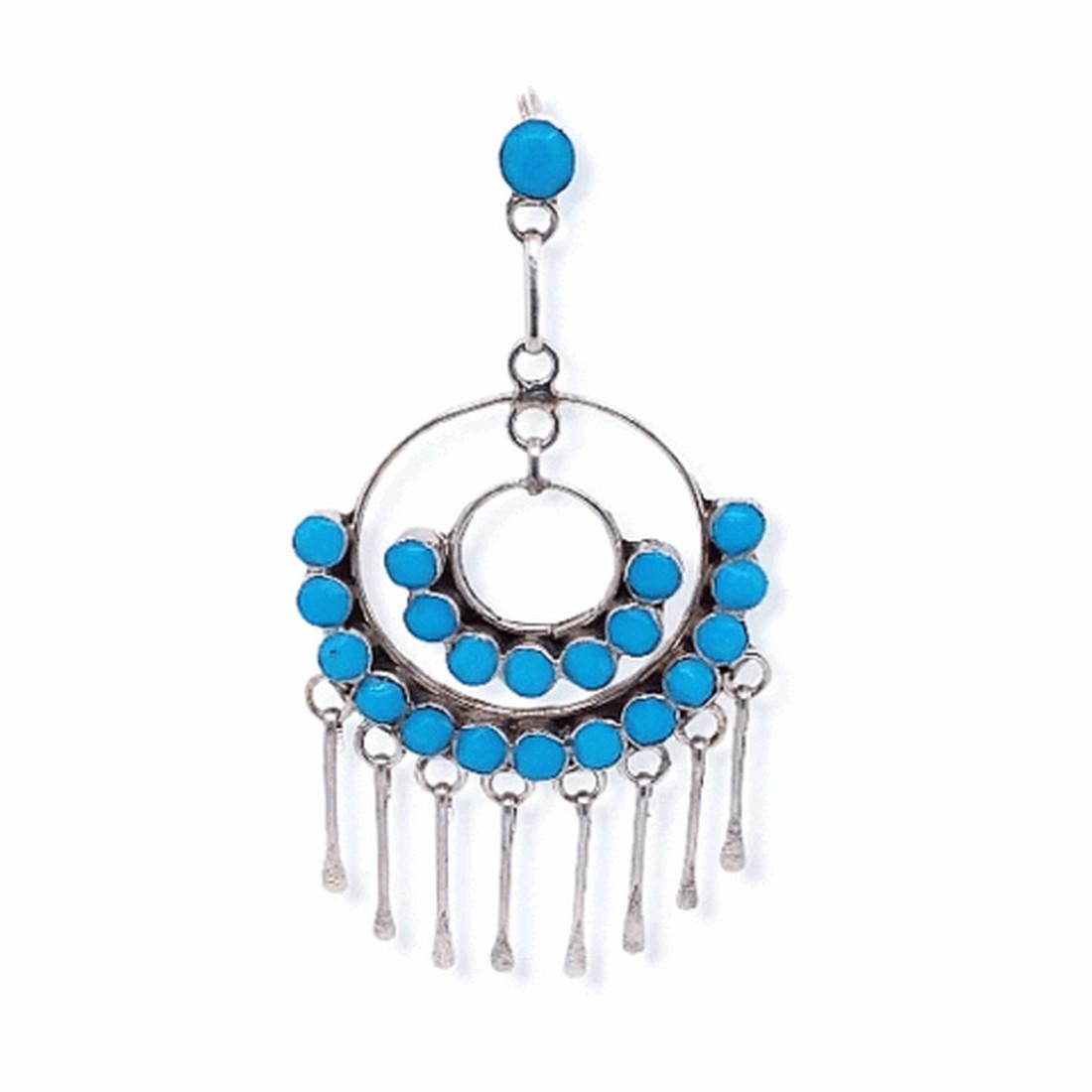 Zuni SemiZuni Semi-Circle Sleeping Beauty Turquoise: Measurements: Body Length: 2 1/2" Body Width: 1 1/4" (widest point) Metal: Sterling Silver Item#: PD125B Sleeping Beauty Turquoise: This stone is truly one of our (and our artists) favorites.