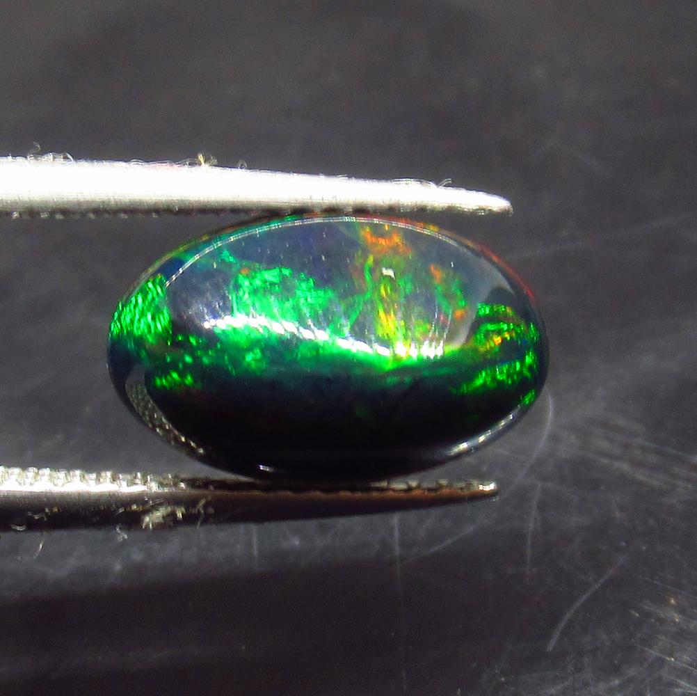 1.98 Ct Natural Ethiopian Black Fire Opal Oval Cab (1 of 2)