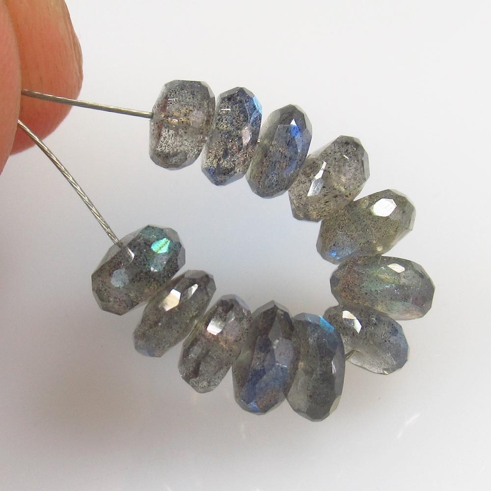 7.82 Ct Natural 12 Labradorite Drilled Round Beads: No Reserve! Title: 7.82 Ct Natural 12 Labradorite Drilled Round Beads Stone Clarity: Semi-Transparent Gemstone: Natural Labradorite Beads Carat Weight: 7.82 Size/Dimensions: 5.20 - 5.90 mm / 12 PC's A