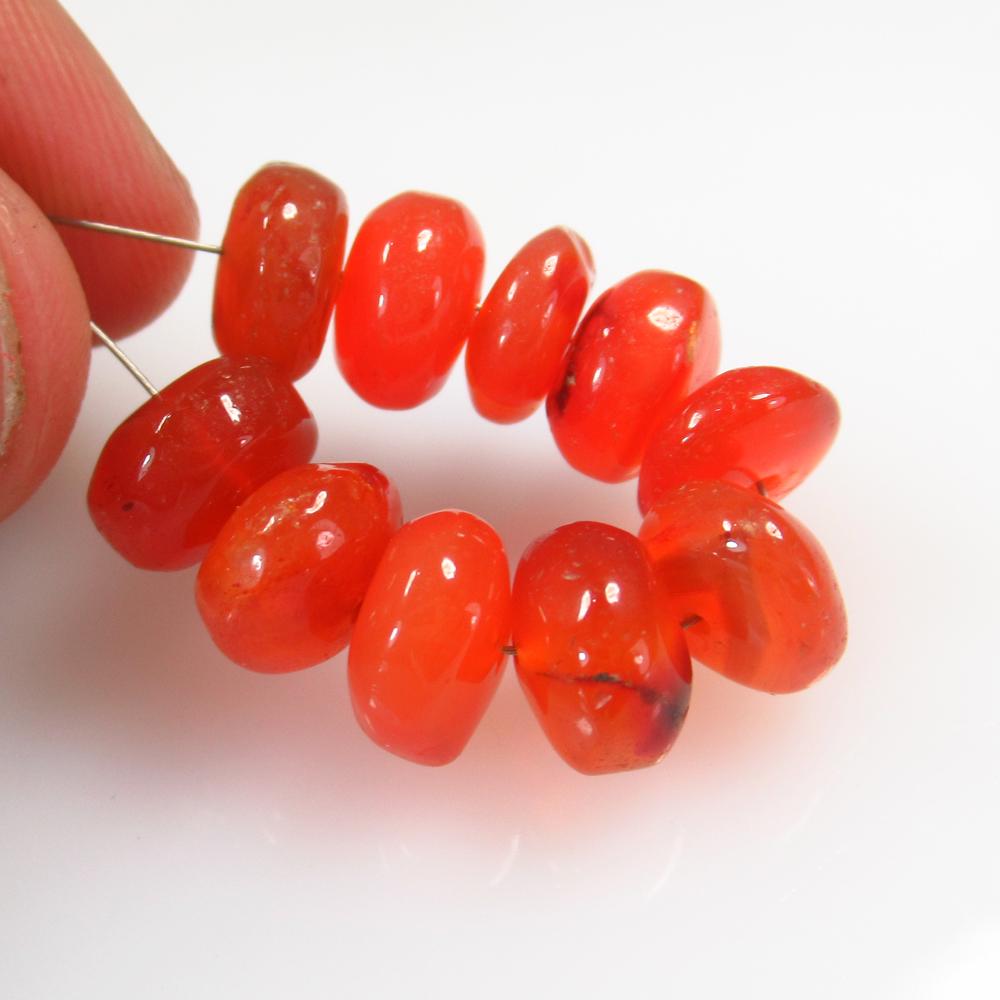 35.58 Ct Natural 10 Drilled Orange Carnelian Round: No Reserve! Title: 35.58 Ct Natural 10 Drilled Orange Carnelian Round Beads Stone Clarity: Semi-Transparent Gemstone: Natural Carnelian Beads Carat Weight: 35.58 Size/Dimensions: 9.10 - 9.60 mm / 10 P