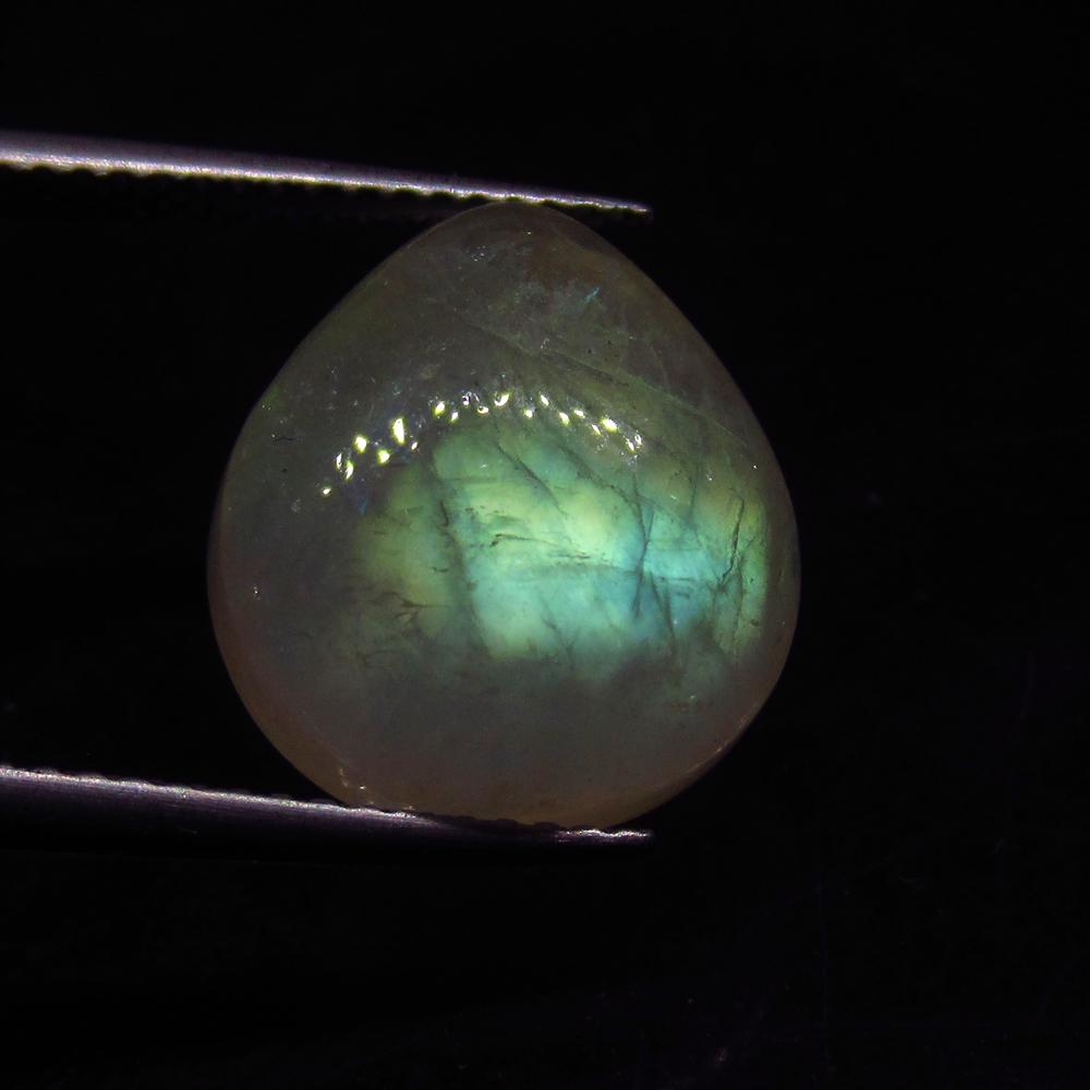 9.60 Ct Natural Blue Moonstone Pear Cab: No Reserve! Title: 9.60 Ct Natural Blue Moonstone Pear Cab Stone Clarity: Translucent Gemstone: Natural Moonstone Carat Weight: 9.6 Size/Dimensions: 14.50 x 13.00 x 7.10 mm Additional Information: Exc
