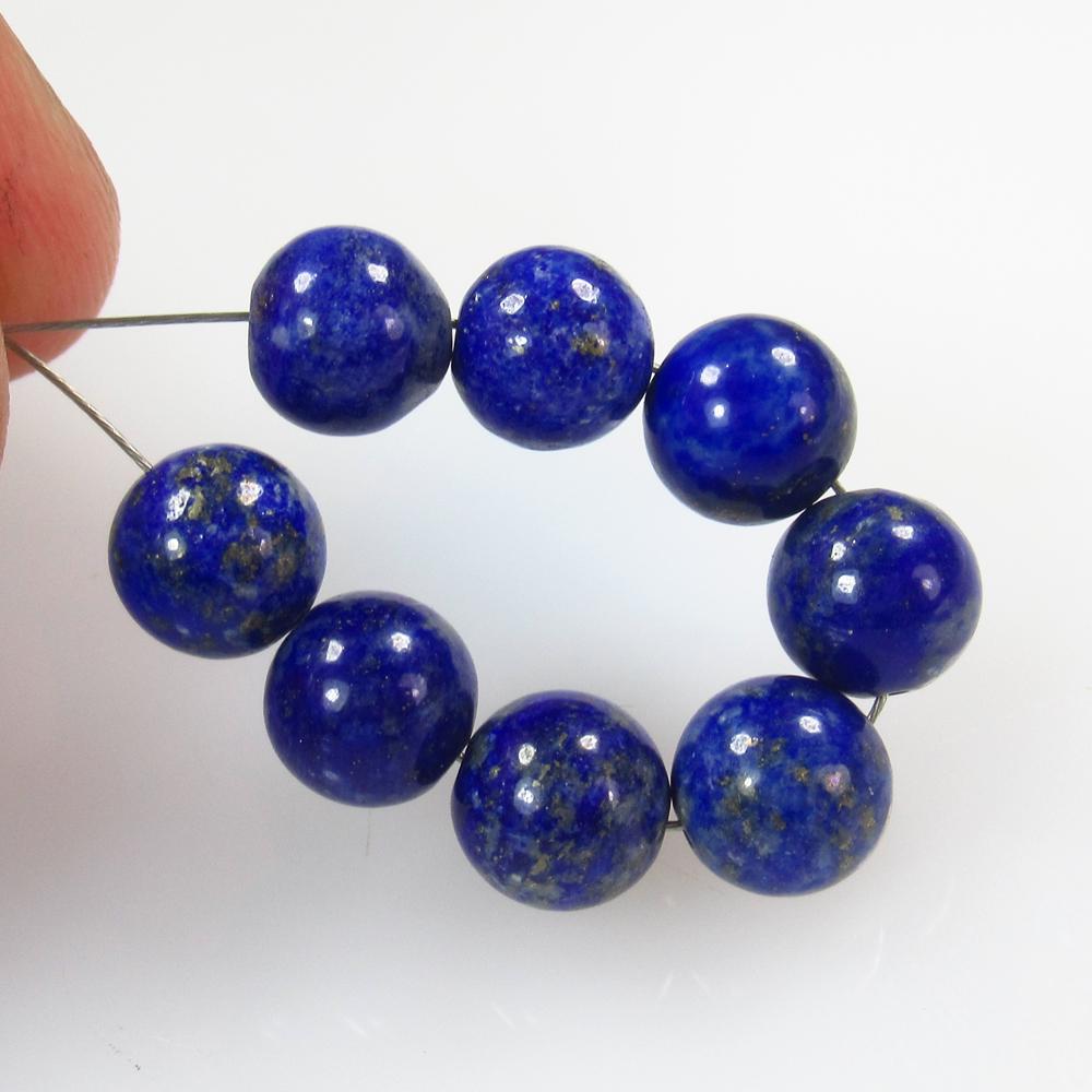18.20 Ct Natural 8 Lapis Lazuli Drilled Round Ball: No Reserve! Title: 18.20 Ct Natural 8 Lapis Lazuli Drilled Round Ball Beads Stone Clarity: Opaque Gemstone: Natural Lapis Lazuli Beads Carat Weight: 18.2 Size/Dimensions: 6.80 to 7.40 mm / 9 PC's Addi