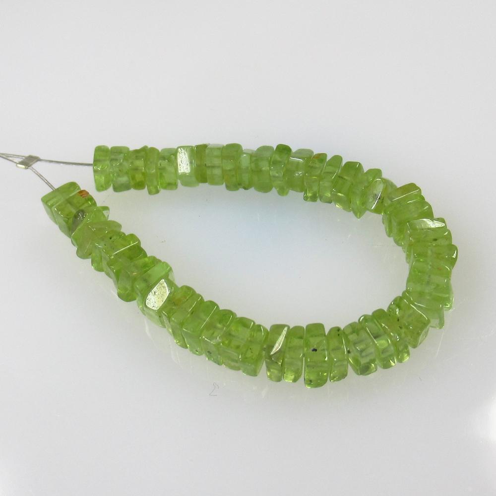 17.18 Ct Natural 52 Drilled Round Peridot Square Beads: No Reserve! Title: 17.18 Ct Natural 52 Drilled Round Peridot Square Beads Stone Clarity: Transparent Gemstone: Natural Peridot Beads Carat Weight: 17.18 Size/Dimensions: 3.90 to 4.20 mm / 52 PC's Addi
