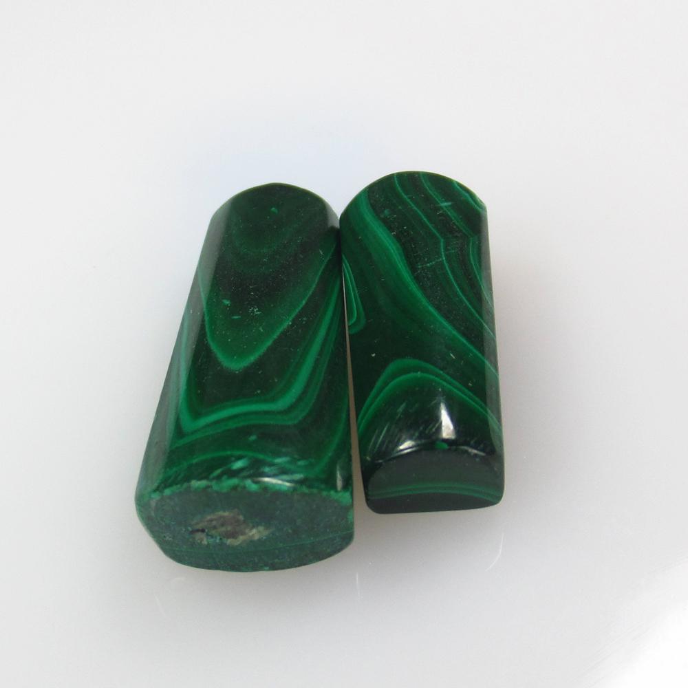 35.89 Ct Natural Green Malachite Fancy Pair: No Reserve! Title: 35.89 Ct Natural Green Malachite Fancy Pair Stone Clarity: Opaque Gemstone: Natural Malachite Carat Weight: 35.89 Size/Dimensions: 20.5x8.0 - 21.5x10.0 mm / 2 PC's Additional Inform