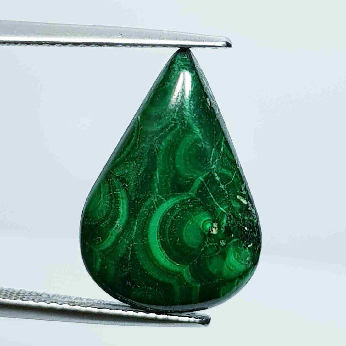 11.86 ct Natural Malachite: No Reserve! Title:11.86 ct Natural Malachite Color/Clarity: Opaque Carat Weight: 11.86 Size/Dimensions: 19.90 x 13.75 x 4.45 Additional Information: Pear - USA/Egypt Shipping: Domestic: Flat-rate of