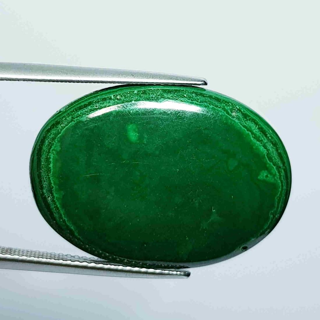 31.79 ct Natural Malachite: No Reserve! Title:31.79 ct Natural Malachite Color/Clarity: Opaque Carat Weight: 31.79 Size/Dimensions: 28.70 x 20.25 x 4.55 Additional Information: Oval - USA/Egypt Shipping: Domestic: Flat-rate of