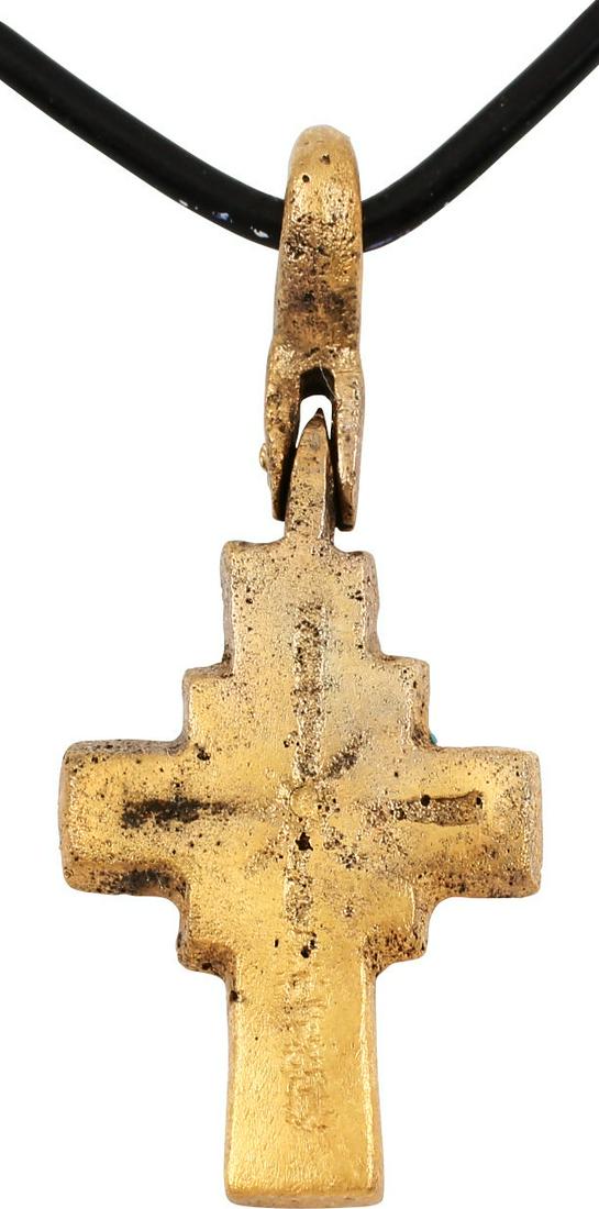 MEDIEVAL PILGRIM’S RELIQUARY CROSS NECKLACE: 7th-10th Century AD. Gilt bronze, 1 5/8” height. Centered cross beam with a square expansion at the junction. Both beams with incised medials and remnants of diagonals at the center square. The back