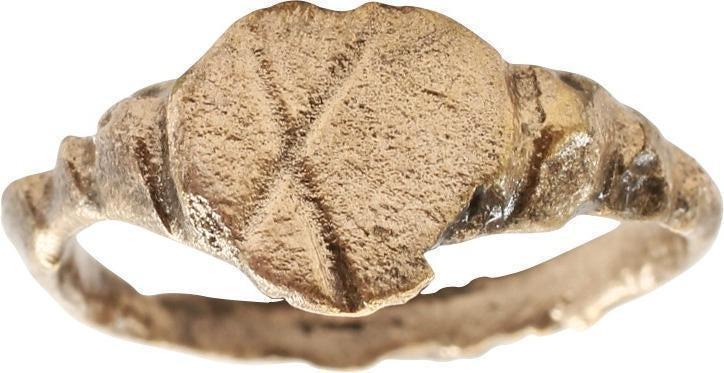 FINE VIKING HEART RING C.900-1050 AD, SZ 7 ¼: Size 7 1/4. Rounded face band, 2,8mm, slightly oval form. Early form heart bezel, slightly flat and made with a slightly cusped top, on chevron stepped shoulders. The cusped top form was used toward t