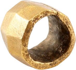 VIKING GILT BEAD, 9TH-11TH CENTURY AD: 6.3mm length, just under 1/4". Hand formed from bronze, forged to hexagonal section with the center swelled to a ridge. Butted seam. Professionally refurbished with the 24karat gold overlay restored. 