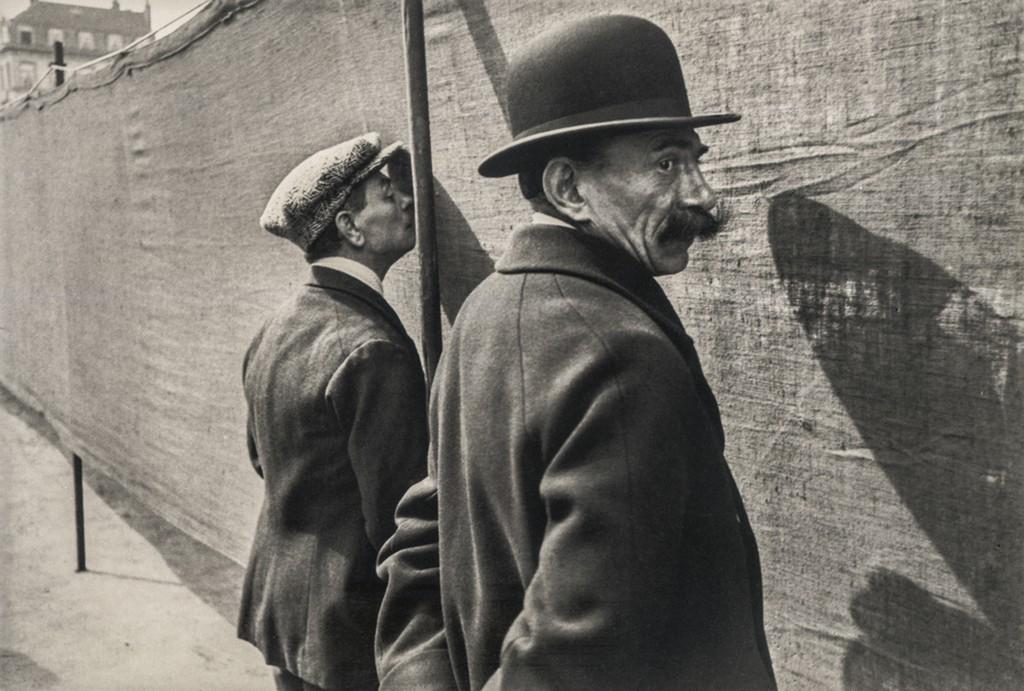 HENRI CARTIER-BRESSON - Brussels, 1932: Artist: Henri Cartier-Bresson Title: Brussels, 1932 Medium: Photo Litho, 1979, USA Dimensions: 10.25x6.95" Description: Heat Wax Mounted on 12x16" Conservation Board Artist Bio: Henri Cartier-Bresson 