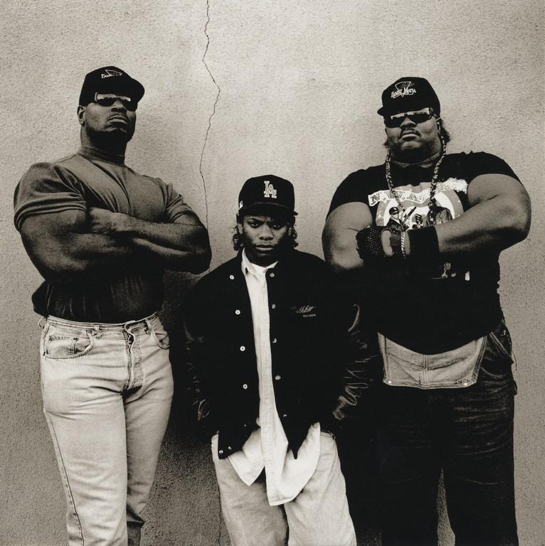 ANTON CORBIJN - Eazy-E: Artist: Anton Corbijn Title: Eazy-E Medium: Photo Litho, 1996, Italy Dimensions: 9.6x9.6" Description: Heat Wax Mounted on 11x14" Conservation Board Artist Bio: Anton Johannes Gerrit Corbijn van Wille