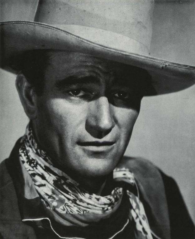 GEORGE HOMMEL - John Wayne, "In Old Oklahoma", 1943: Artist: George Hommel Title: John Wayne, In Old Oklahoma, 1943 Medium: Photo Litho, 1977, USA Dimensions: 6.7x8.25" Description: Heat Wax Mounted on 11x14" Conservation Board Artist Bio: Reserve: $45.