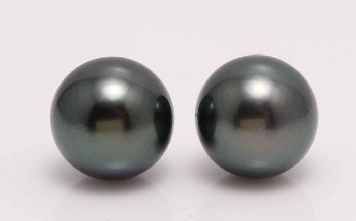 14kt. White Gold - 11x12mm Peacock Tahitian Pearls -: Title: 14kt. White Gold - 11x12mm Peacock Tahitian Pearls - Earrings Description: Produced by the Pinctada Margaritifera oyster in the tropical lagoons of French Polynesia, these pearls have a natural