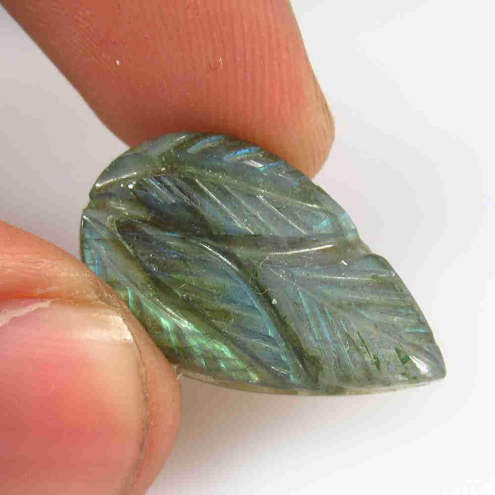 15.80 Ctw Natural Labradorite Carving: No Reserve! Title: 15.80 Ctw Natural Labradorite Carving Stone Clarity: Opaque Gemstone: Labradorite Carat Weight: 15.8 Size/Dimensions: 24.00 x 14.40 x 6.10 mm Additional Information: Nice Carving /