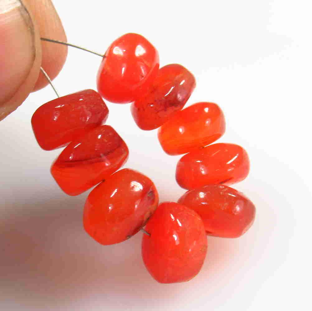 34.20 Ctw Natural 9 Carnelian Drilled Round Beads: No Reserve! Title: 34.20 Ctw Natural 9 Carnelian Drilled Round Beads Stone Clarity: Transparent Gemstone: Carnelian Beads Carat Weight: 34.20 Size/Dimensions: 8.90 to 9.80 mm / 9 PC's Additional Infor