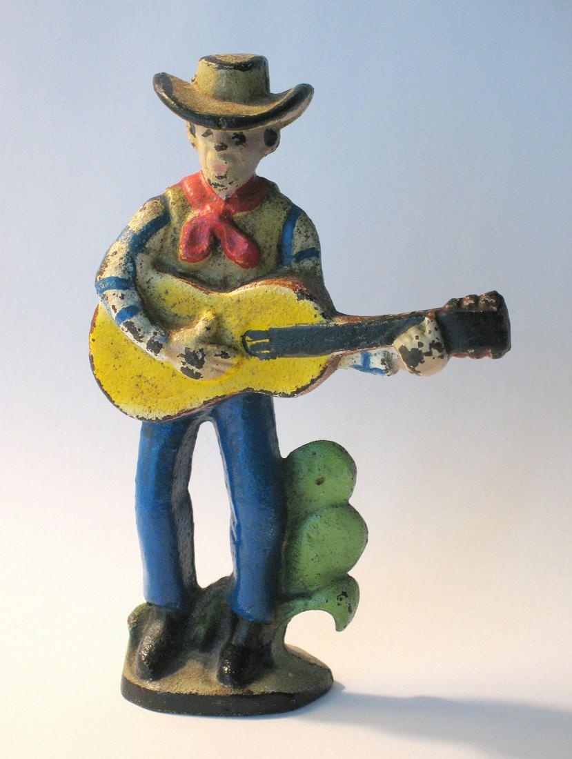 Vintage cast iron cowboy bottle opener. (1 of 3)