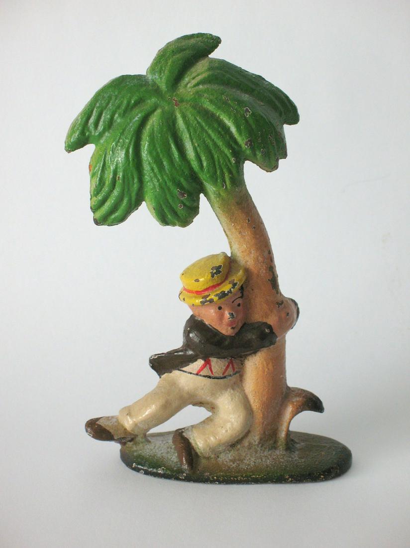 Vintage cast iron palm tree bottle opener. (1 of 2)