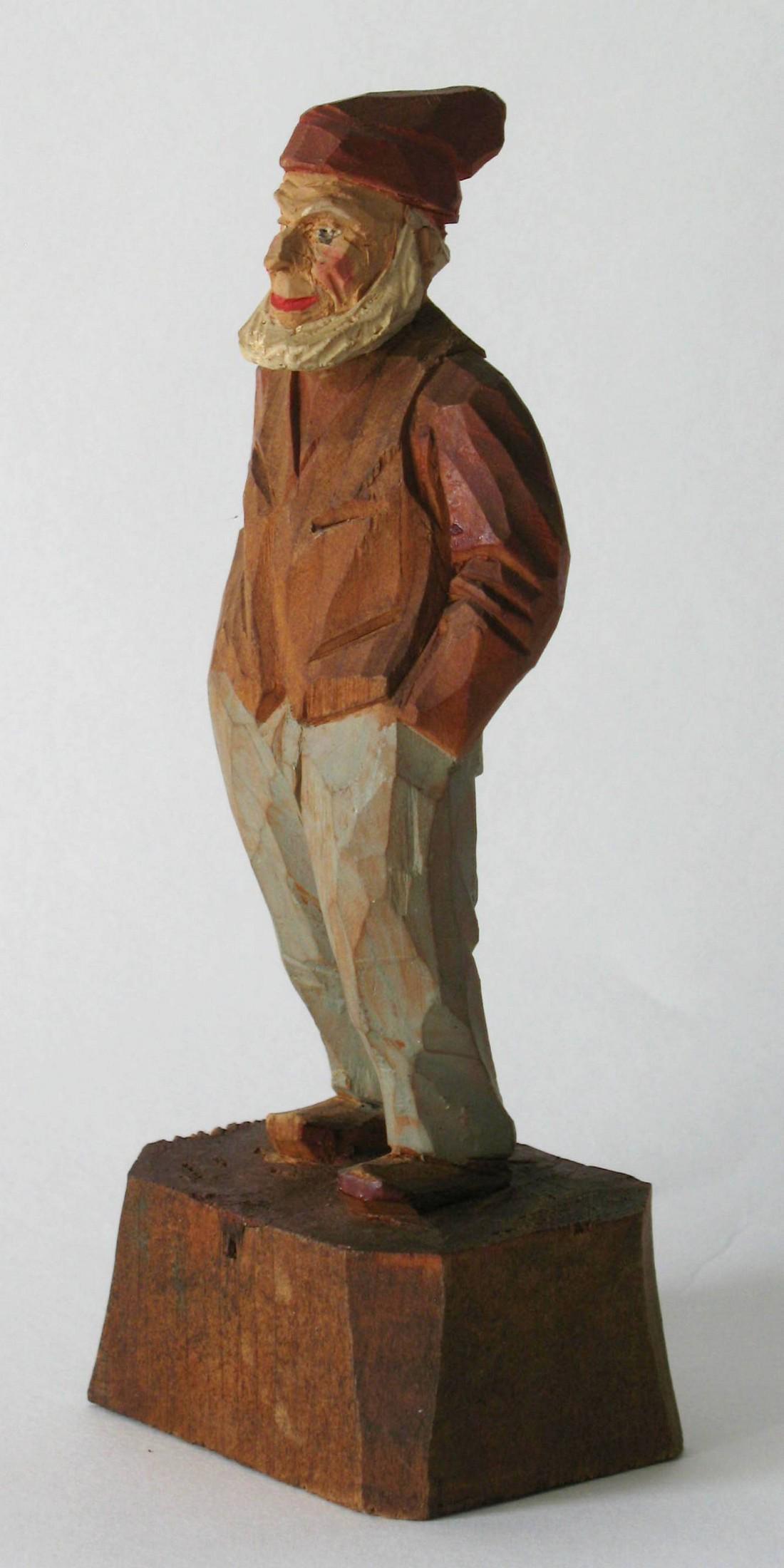 Vintage folk art wood carving.: Title: Vintage folk art wood carving. Date/Period: 1930's Dimension: 5" tall Additional Information: Vintage folk art wood carving of an elderly gentleman with white hair wearing a red stocking cap. S