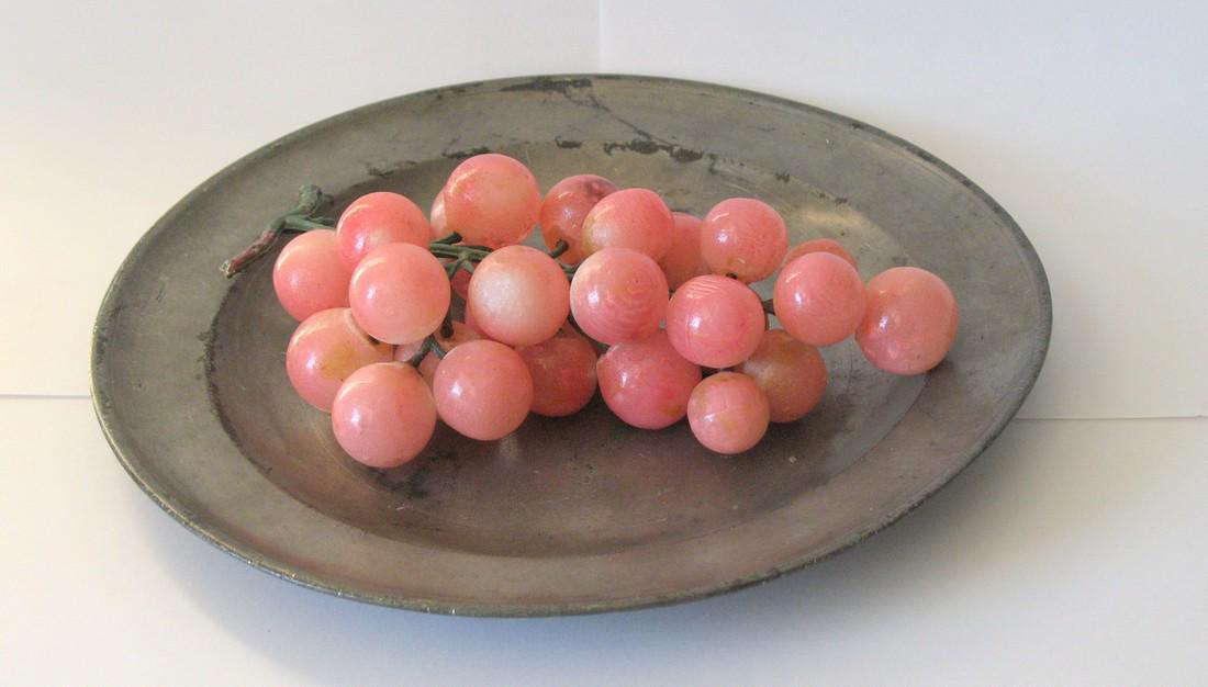 Cluster of vintage stone grapes. (1 of 2)