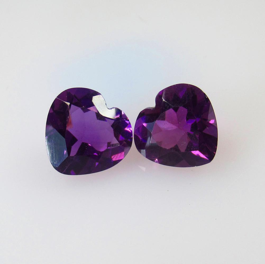 8.15 Ct Natural Purple Amethyst Heart Pair: Title: 8.15 Ct Natural Purple Amethyst Heart Pair Stone Clarity: VVS Gemstones: Natural Amethyst Carat Weights: 8.15 Size/Dimensions: 11.10 x 10.70 x 6.60 mm / 2 PC's Additional Information: Excellent