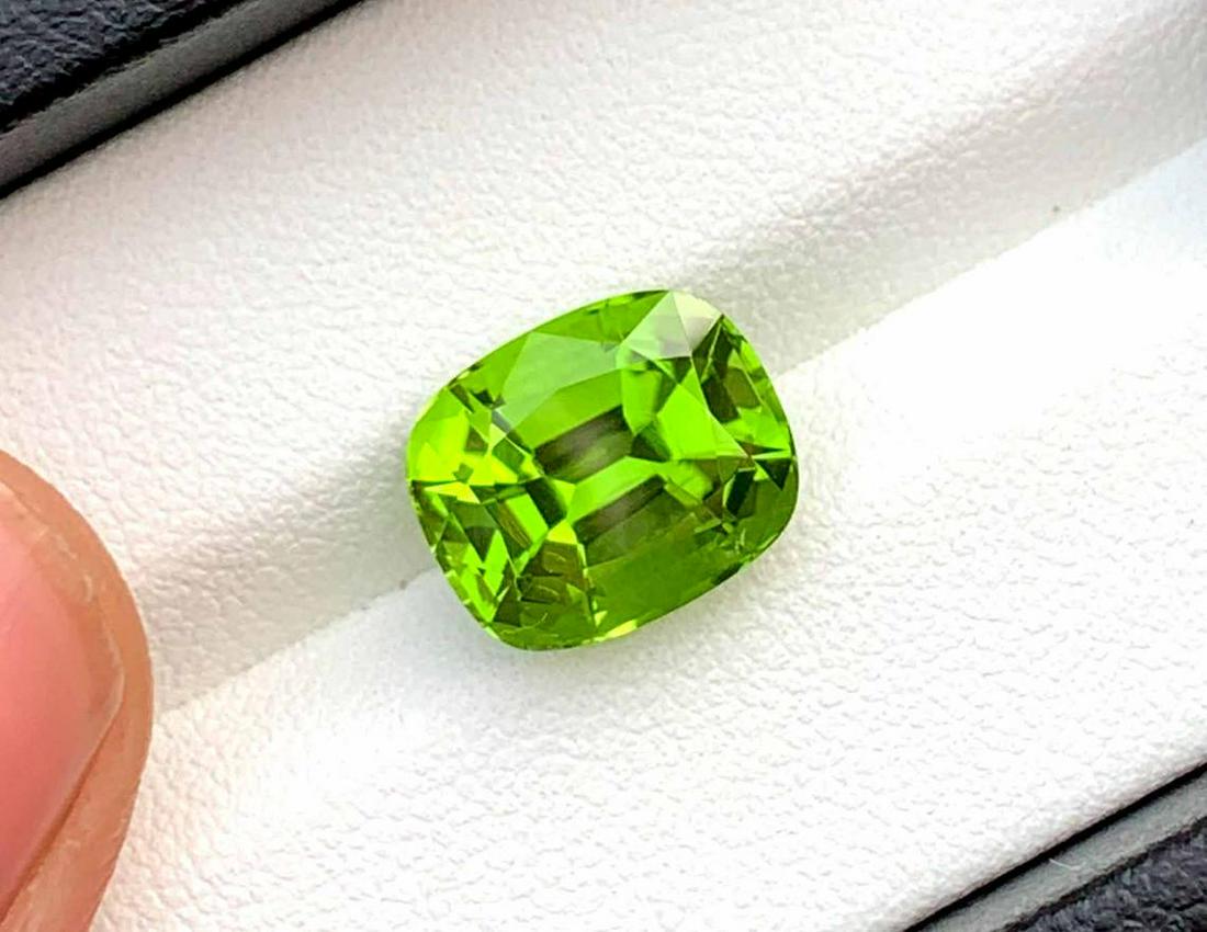 Cushion Cut Peridot Loose Gemstone From Mansehra: Materials: peridot Read the full description Carat weight: 5.80 Description Cushion Cut Peridot Loose Gemstone From Mansehra Pakistan Clarity : Loupe Clean Weight - 5.80 carats Dimensions - 11.3*9.5*7
